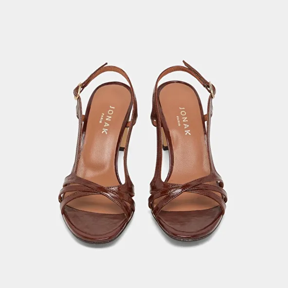 High-heeled sandals in brown shiny leather