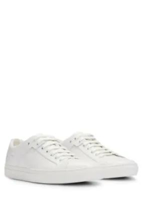 Lace-up trainers in leather with subtle branding