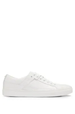 Lace-up trainers in leather with subtle branding