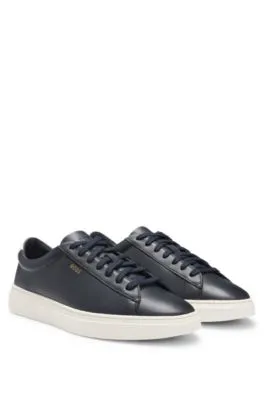 Lace-up trainers in polished leather with logo details