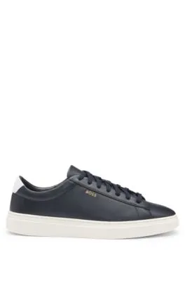 Lace-up trainers in polished leather with logo details