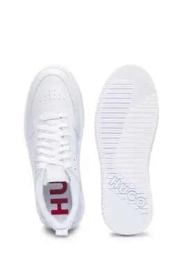 Mixed-material trainers with raised logo