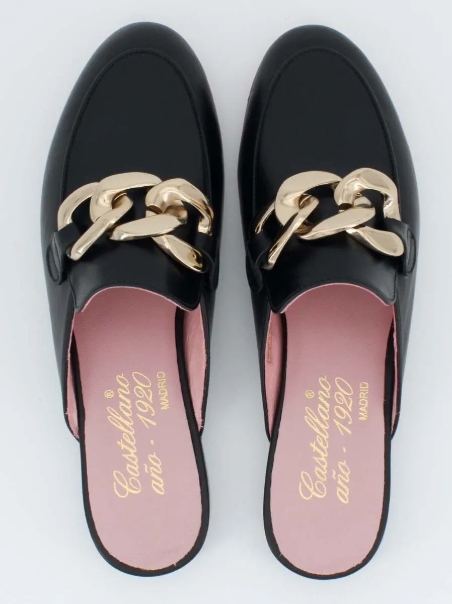 Mules Saint Tropez adorno color negro